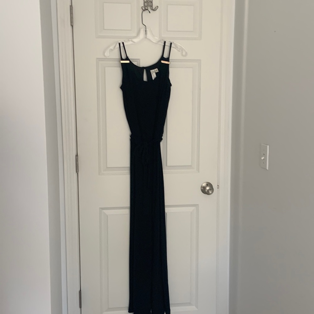 Black jumpsuit with gold accents